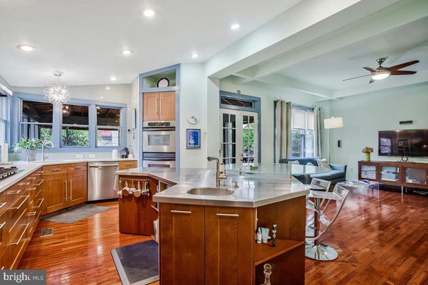 Chandelier, Dining room, Interior, Kitchen, Recessed Lighting, Stainless Steel Appliances, Wood Texture Flooring