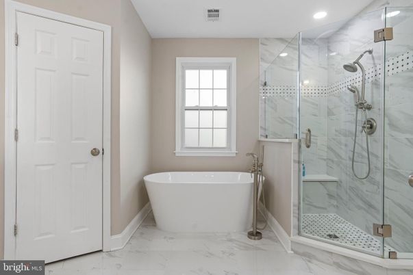 Bathroom, Free Standing Baths, Glass Shower, Interior, Marble, Marble Walls, Recessed Lighting