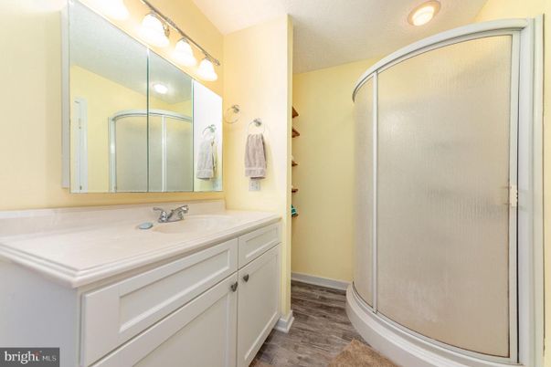 Bathroom, Glass Shower, Interior, Recessed Lighting, Wood Texture Flooring