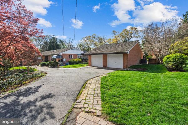 Attached, Backyard, Detached Garage, Exterior, Facade, Brick Facade, Cape Cod