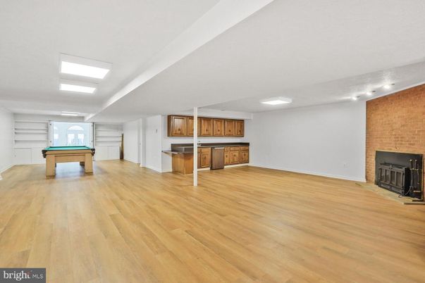 Billiard Table, Fireplace, Game Room, Interior, Recessed Lighting, Stone Walls, Wood Texture Flooring