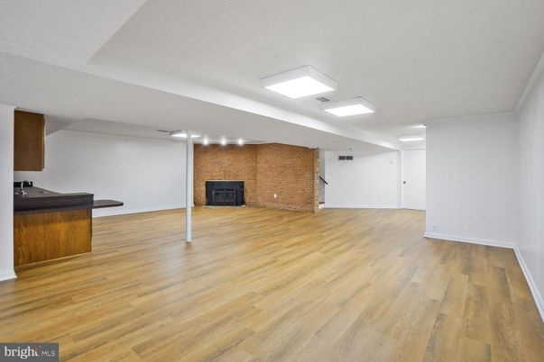 Empty room, Fireplace, Interior, Stone Walls, Wood Texture Flooring