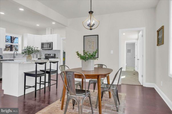 Dining room, Interior, Kitchen, Pendant Lights, Recessed Lighting, Stainless Steel Appliances, Wood Texture Flooring