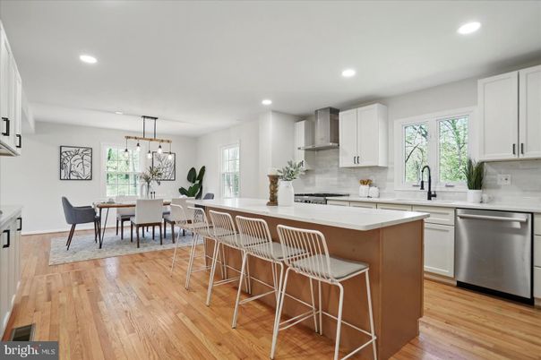 Dining room, Interior, Kitchen, Pendant Lights, Recessed Lighting, Stainless Steel Appliances, Wood Texture Flooring