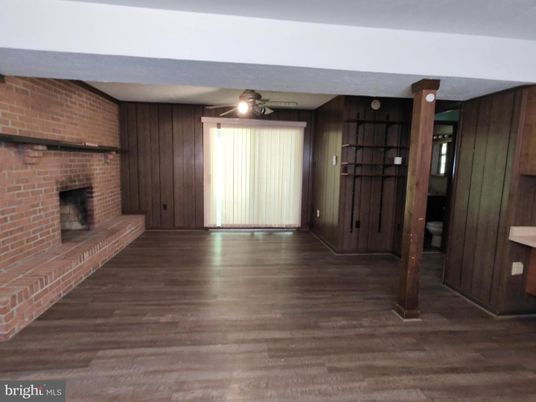 Empty room, Fireplace, Interior, Stone Walls, Wood Texture Flooring
