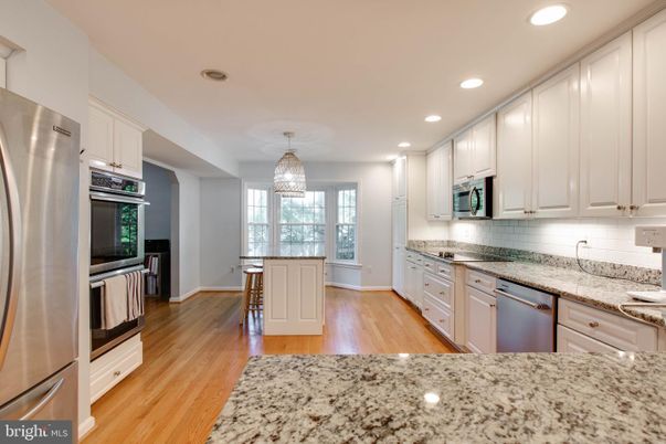 Chandelier, Interior, Kitchen, Recessed Lighting, Stainless Steel Appliances, Wood Texture Flooring