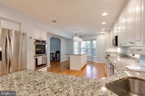 Chandelier, Interior, Kitchen, Recessed Lighting, Stainless Steel Appliances, Wood Texture Flooring