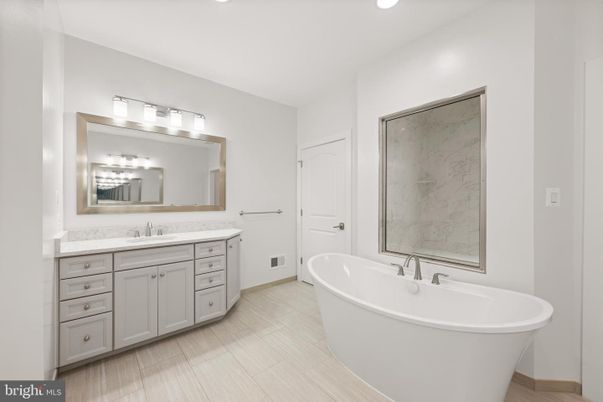 Bathroom, Dual Sink Vanities, Free Standing Baths, Interior, Marble Walls, Recessed Lighting