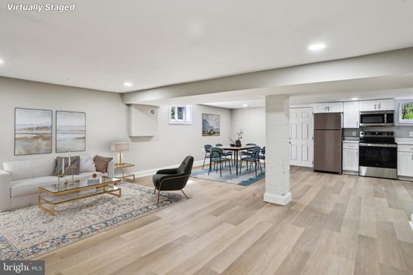 Dining room, Interior, Kitchen, Living room, Recessed Lighting, Stainless Steel Appliances, Wood Texture Flooring