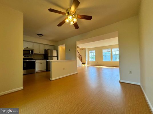 Empty room, Interior, Kitchen, Stainless Steel Appliances, Wood Texture Flooring