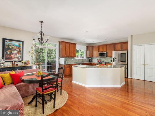 Chandelier, Dining room, Interior, Kitchen, Recessed Lighting, Stainless Steel Appliances, Wood Texture Flooring