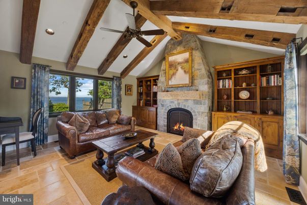 Fireplace, Interior, Living room, Recessed Lighting, Stone Walls, Wooden Beams