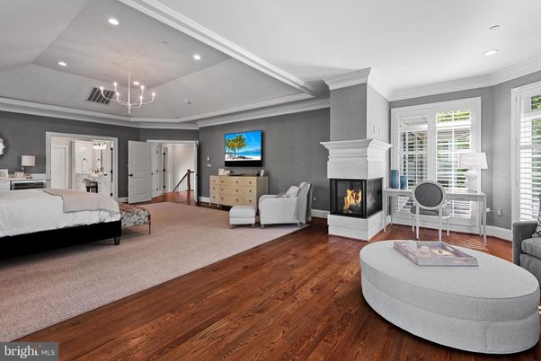 Bedroom, Fireplace, Interior, Pendant Lights, Recessed Lighting, Wood Texture Flooring