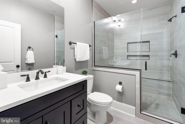 Bathroom, Glass Shower, Interior, Recessed Lighting, Wood Texture Flooring