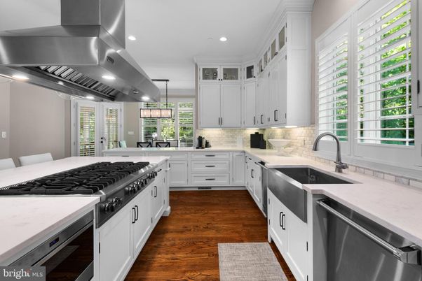 Chandelier, Interior, Kitchen, Pendant Lights, Recessed Lighting, Stainless Steel Appliances, Wood Texture Flooring