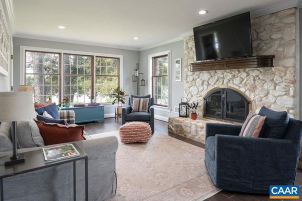 Fireplace, Interior, Living room, Recessed Lighting, Stone Walls, Wood Texture Flooring