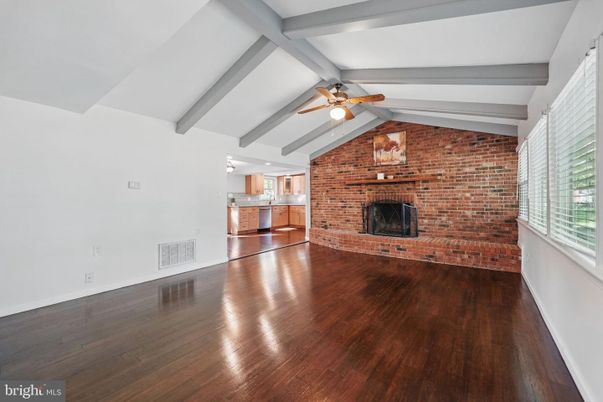 Empty room, Fireplace, Interior, Stone Walls, Wooden Beams, Wood Texture Flooring