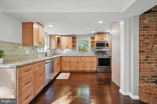 Interior, Kitchen, Recessed Lighting, Stainless Steel Appliances, Stone Walls, Wood Texture Flooring