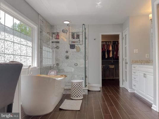 Bathroom, Glass Shower, Interior, Marble Walls, Wood Texture Flooring