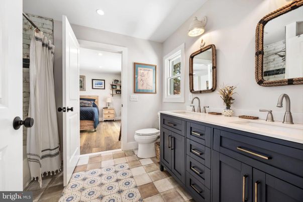 Bathroom, Dual Sink Vanities, Interior, Recessed Lighting, Wood Texture Flooring