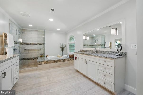 Bathroom, Dual Sink Vanities, Glass Shower, Interior, Recessed Lighting, Wood Texture Flooring
