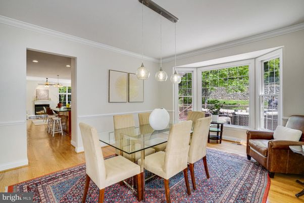 Dining room, Fireplace, Interior, Pendant Lights, Recessed Lighting, Wood Texture Flooring