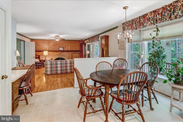 Dining room, Fireplace, Interior, Living room, Pendant Lights, Stone Walls, Wood Texture Flooring