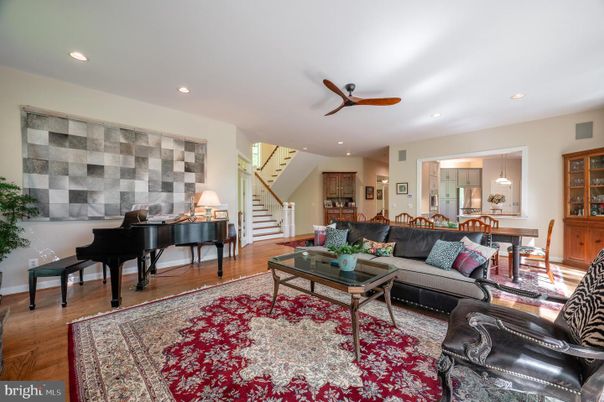Dining room, Interior, Living room, Pendant Lights, Piano, Recessed Lighting, Wood Texture Flooring