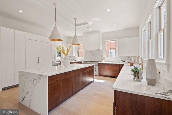 Interior, Kitchen, Marble Walls, Pendant Lights, Recessed Lighting, Wood Texture Flooring