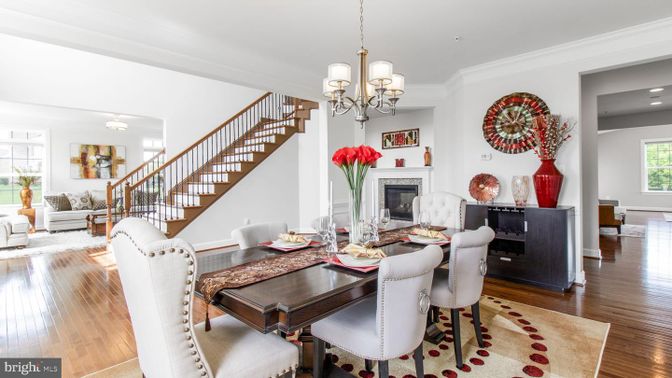 Chandelier, Dining room, Fireplace, Interior, Living room, Recessed Lighting, Wood Texture Flooring