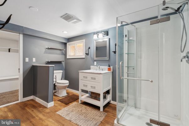 Bathroom, Glass Shower, Interior, Recessed Lighting, Wood Texture Flooring