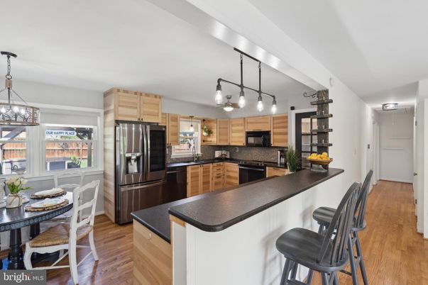 Dining room, Interior, Kitchen, Pendant Lights, Stainless Steel Appliances, Wood Texture Flooring