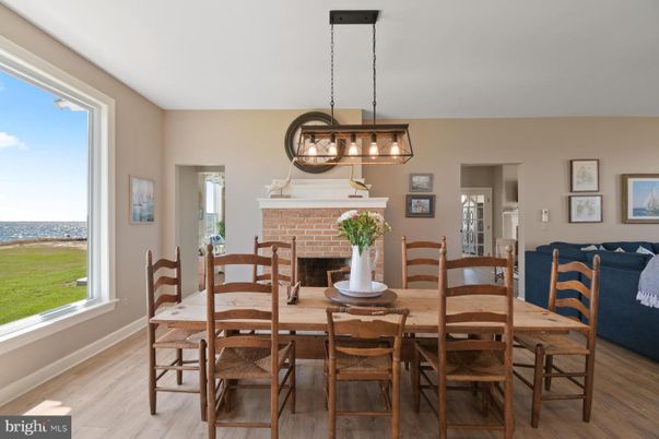 Dining room, Fireplace, Interior, Pendant Lights, Wood Texture Flooring