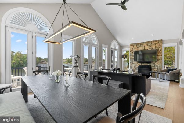 Dining room, Fireplace, Interior, Living room, Pendant Lights, Recessed Lighting, Stone Walls, Wood Texture Flooring