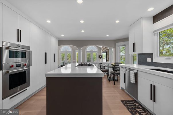 Dining room, Interior, Kitchen, Recessed Lighting, Stainless Steel Appliances, Wood Texture Flooring