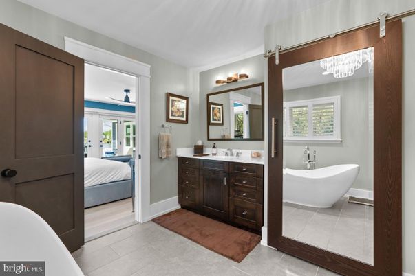 Bathroom, Bedroom, Dual Sink Vanities, Free Standing Baths, Interior, Wood Texture Flooring