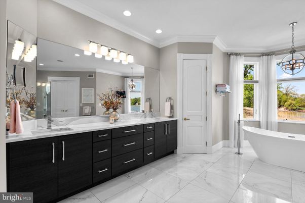 Bathroom, Dual Sink Vanities, Free Standing Baths, Interior, Marble, Pendant Lights, Recessed Lighting