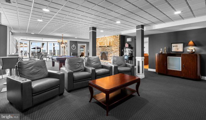 Billiard Table, Chandelier, Fireplace, Game Room, Interior, Living room, Recessed Lighting, Stone Walls