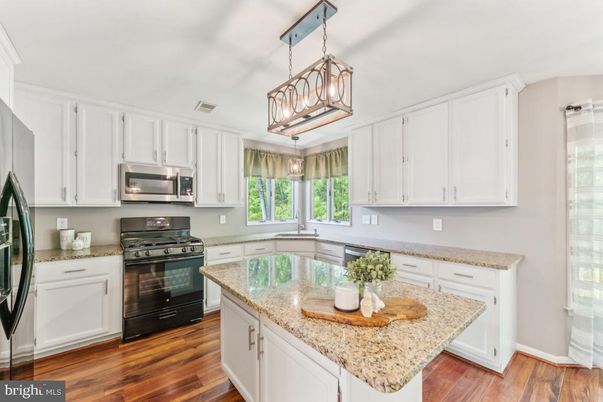 Interior, Kitchen, Pendant Lights, Stainless Steel Appliances, Wood Texture Flooring