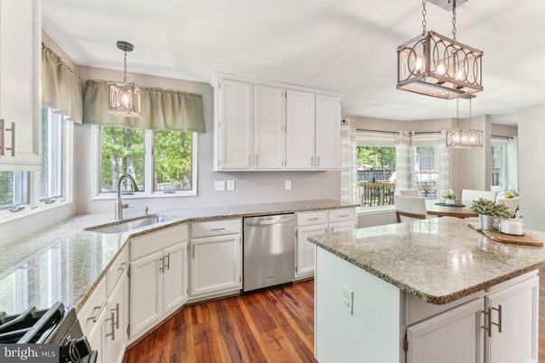 Dining room, Interior, Kitchen, Pendant Lights, Stainless Steel Appliances, Wood Texture Flooring