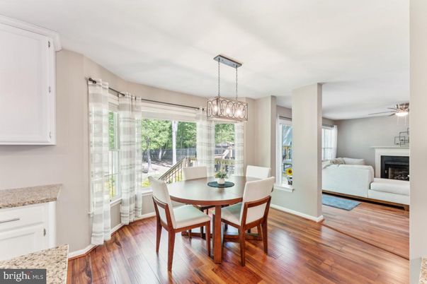 Dining room, Fireplace, Interior, Living room, Pendant Lights, Wood Texture Flooring