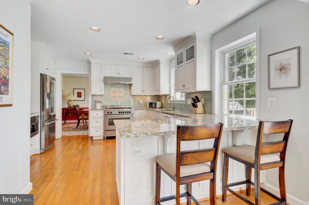 Dining room, Interior, Kitchen, Recessed Lighting, Stainless Steel Appliances, Wood Texture Flooring