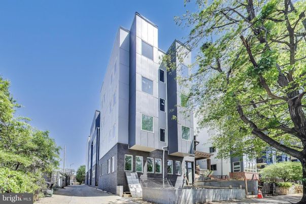 Exterior, Facade, Brick Facade, Condo Building