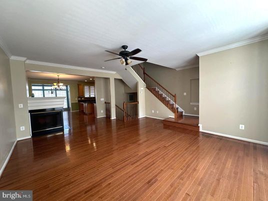 Chandelier, Empty room, Fireplace, Interior, Recessed Lighting, Wood Texture Flooring