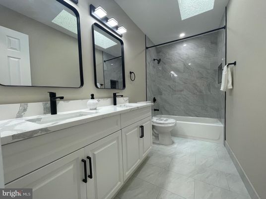 Bathroom, Dual Sink Vanities, Interior, Marble, Marble Walls, Recessed Lighting