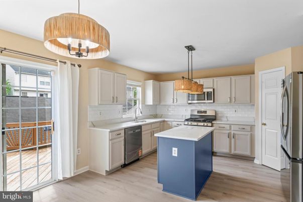Interior, Kitchen, Pendant Lights, Stainless Steel Appliances, Wood Texture Flooring