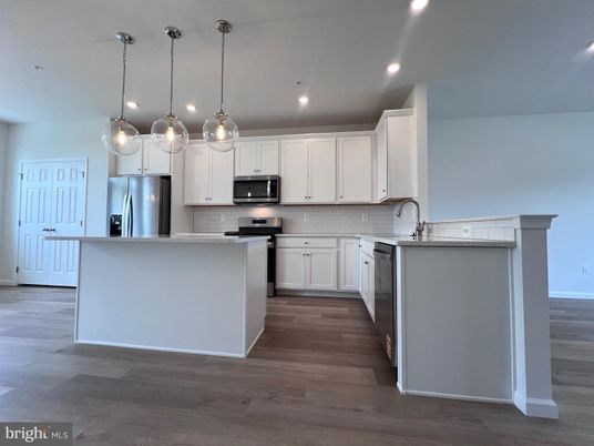 Interior, Kitchen, Pendant Lights, Recessed Lighting, Stainless Steel Appliances, Wood Texture Flooring