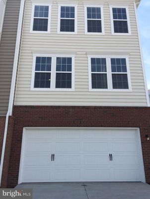 Attached, Exterior, Facade, Brick Facade, Rowhouse