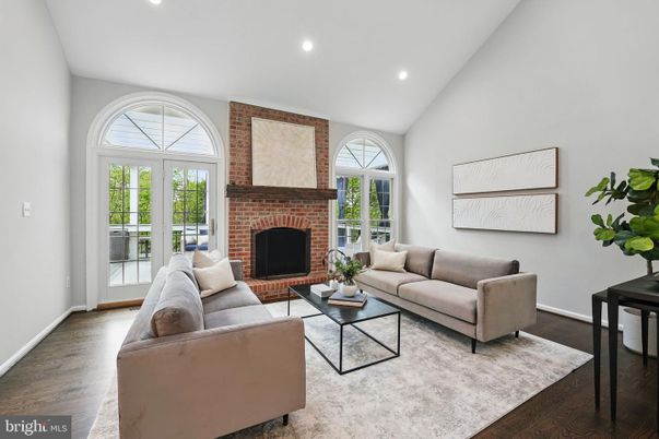 Fireplace, Interior, Living room, Recessed Lighting, Stone Walls, Wood Texture Flooring