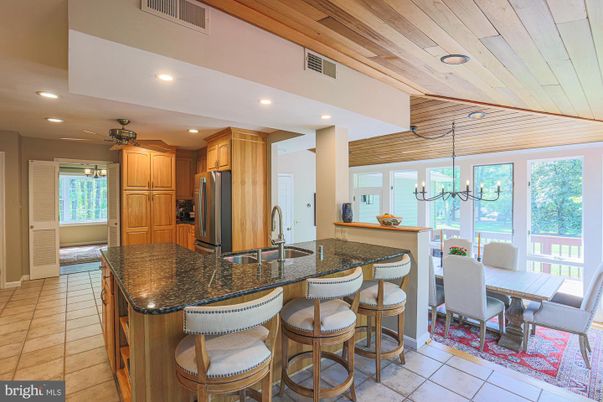Chandelier, Dining room, Interior, Kitchen, Recessed Lighting, Stainless Steel Appliances, Wooden Ceilings